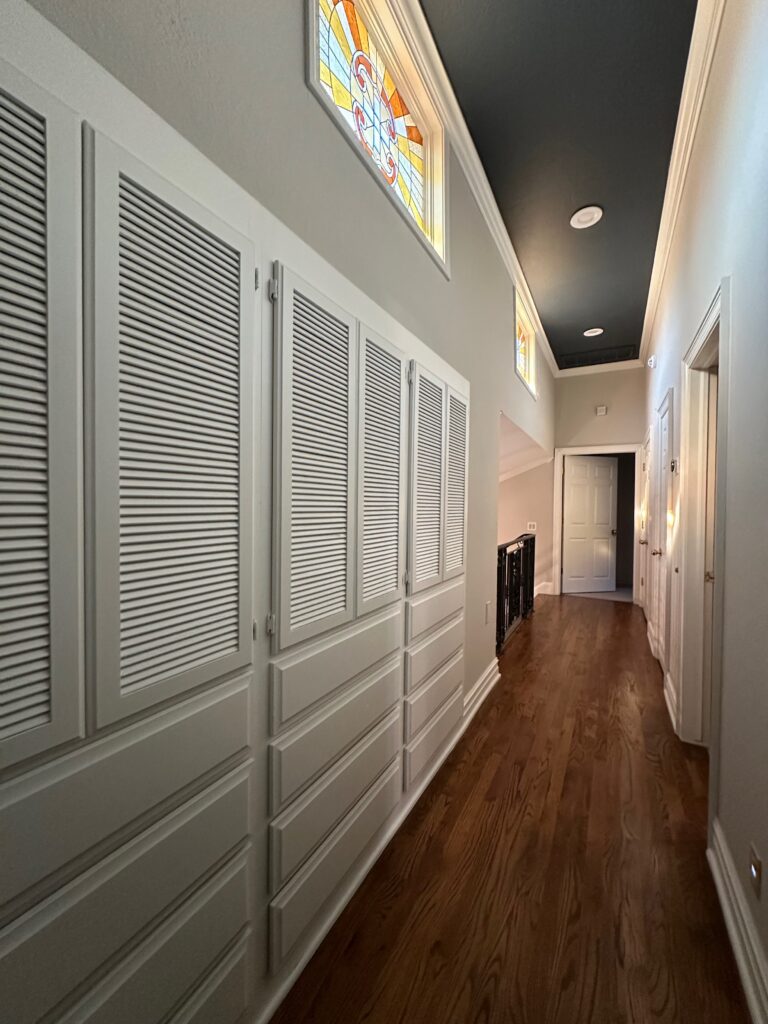 Hallway storage cabinets painted white