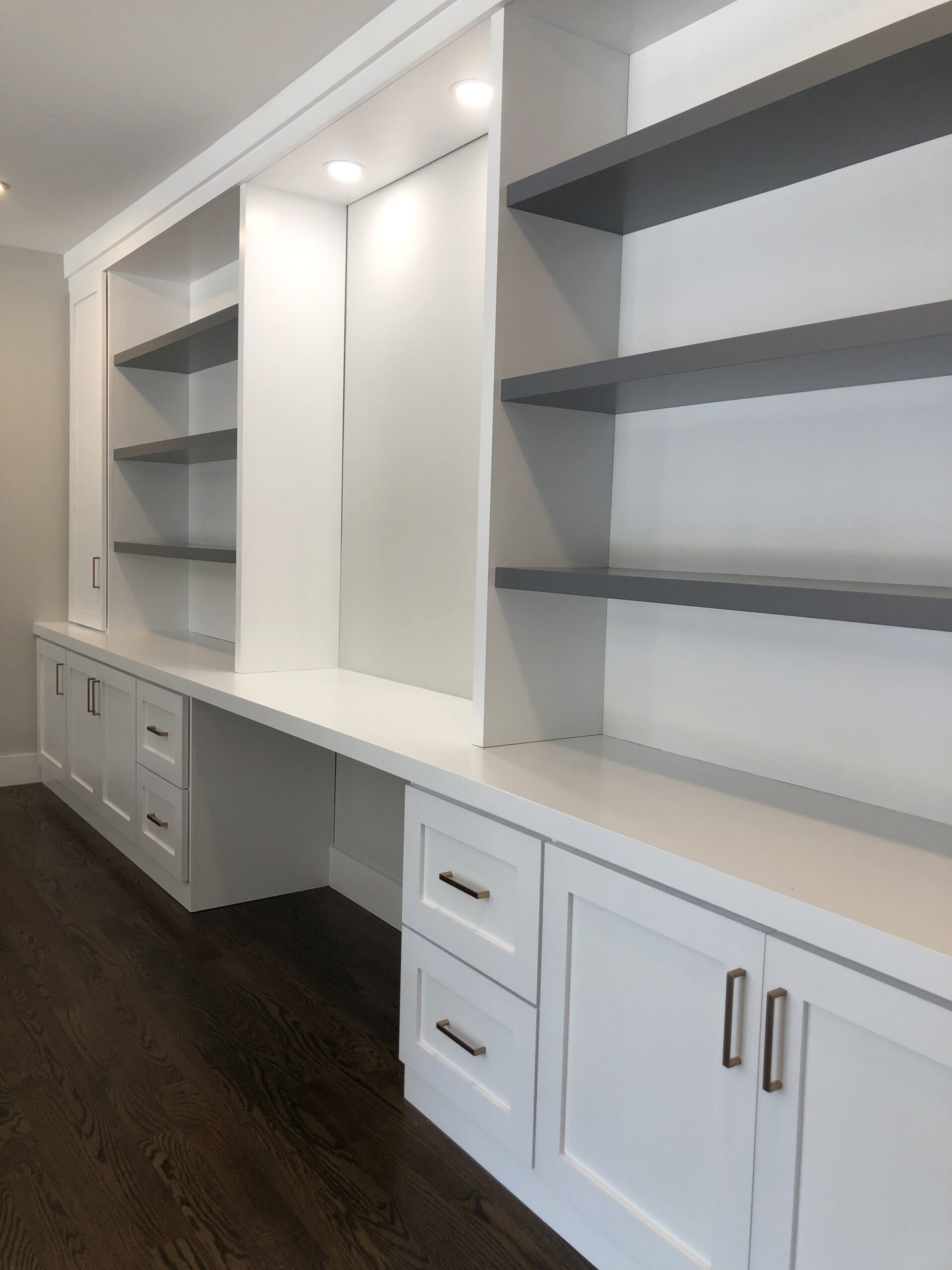 Spray finished kitchen cabinets painted white in Tulsa home